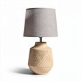Ceramic table lamp with textured base and grey fabric shade 25 x 25 x 50cm